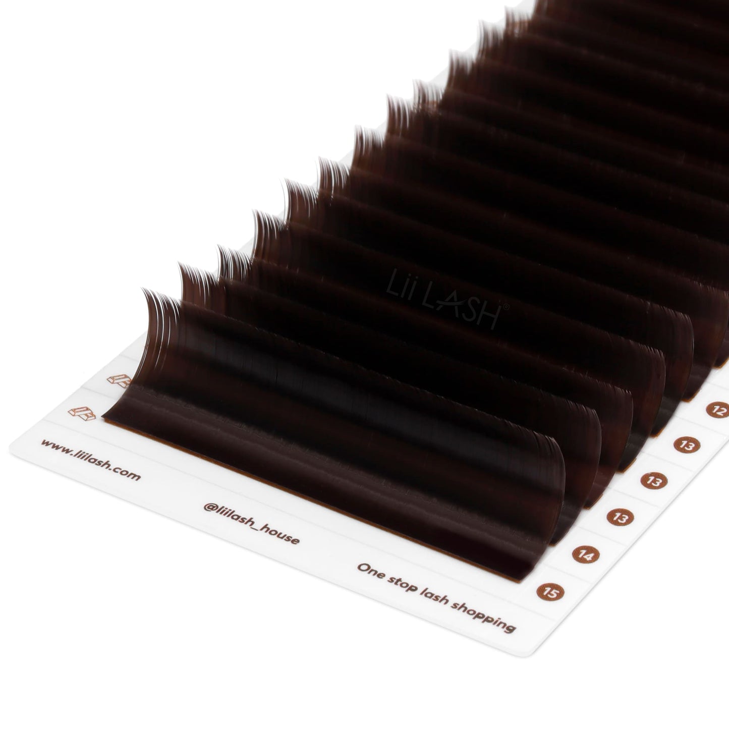 Closeup of Chocolate brown eyelash extension from a Dutch angle in lash tray